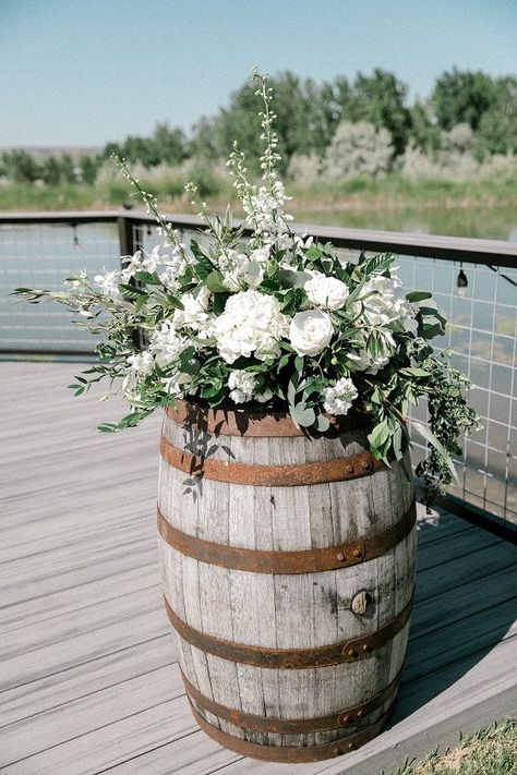 April Sky Photography Camelot Ranch Events Billings, MT Whiskey Barrel Flowers, Green Ceremony, Barrel Wedding Decor, Wine Barrel Wedding, Barrel Flowers, Barrel Wedding, Ceremony Florals, Billings Mt, Montana Wedding