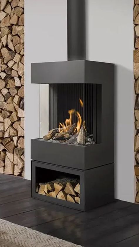 black fireplace unique fireplace gas stove fireplace in a modern home luxury fireplace Modern Fireplace Ideas Living Rooms, Small Wood Stove, Standing Fireplace, Lpg Gas, Plain Background, Freestanding Fireplace, Rocket Stoves, Floating Shelves Diy, Mediterranean Home