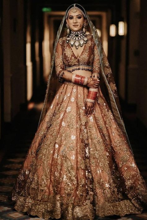 As a bride-to-be, the quest for the latest trends, color schemes, and silhouettes never end! And trust us, it ain't as easy as it seems to be. Most of them cannot even think past a red, pink or gold bridal lehenga.. and well, isn't that is too mainstream? But what if there's a totally offbeat, vintage color palette secretly being admired by the millennial brides? Bridal Lehenga Designs, Latest Bridal Lehenga, Lehenga Red, Wedding Lehenga Designs, Indian Bride Outfits, Bridal Lehenga Collection, Indian Bridal Lehenga, Bridal Lehenga Red, Indian Bridal Dress