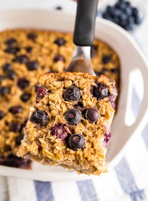 This blueberry baked oatmeal is studded with blueberries and naturally sweetened with bananas and pure maple syrup. Can be made with fresh or frozen blueberries! Gluten-free and vegan-friendly. #bakedoatmeal #blueberry #oatmeal #vegan #glutenfree Healthy Pantry Staples, Blueberry Baked Oatmeal, Blueberry Oatmeal Bake, Baked Oatmeal Healthy, Eating Bird Food, Healthy Pantry, Baked Oatmeal Recipes, Blueberry Oatmeal, Easy Blueberry