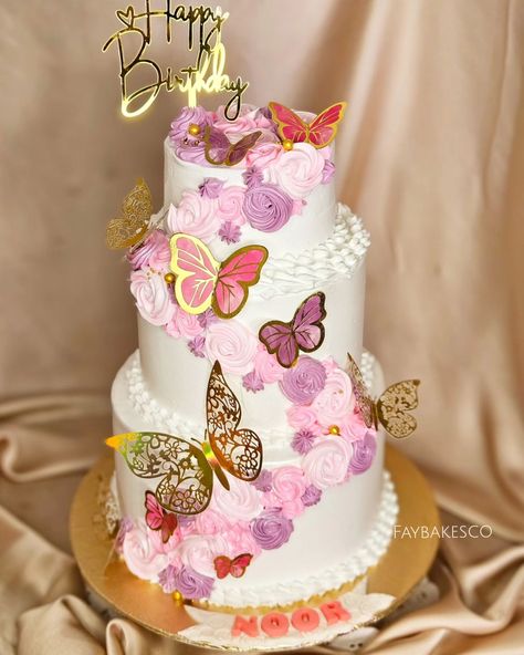 Noor's birthday with this beautiful three-tier cake, swirls & butterflies 🦋 💗 A sweet treat for a sweet little one! #faybakesco #faybakescobyfaiza #malakwal #cakes #homebaking #Pinterest #Birthday #Birthdaycake #customcake #celebrationcake Birthday Cake Three Tier, Three Tier Cake Birthday, Butterfly Theme Cake, Personality Board, Cartoon Birthday Cake, 21st Ideas, Tiered Cakes Birthday, Cartoon Birthday, Three Tier Cake