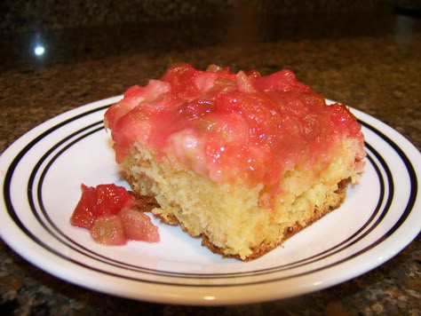 Rhubarb Cake - spread out rhubarb in pan, sprinke with one package flavored Jello (raspberry) and 1/2 cup sugar and then dot with butter then cover with a white cake (mixed based on directions).  Never fails to please, ever. Strawberry Jello Cake, Rhubarb Upside Down Cake, Fresh Rhubarb, Rhubarb Desserts, Jello Cake, Rhubarb Cake, Rhubarb Recipes, Pineapple Upside Down Cake, White Cake Mixes