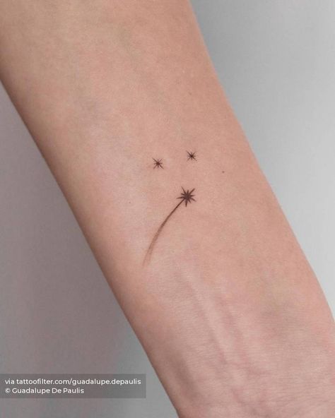 MInimalistic style shooting star tattoo placed on the inner forearm. Star Elbow Tattoos For Women, Stars Aligning Tattoo, Star Line Work Tattoo, Turnover Band Tattoo, Tattoo Star Design, Dainty Firework Tattoo, Stardust Tattoo Design, Star Tattoo Placement Ideas, Wish Upon A Star Tattoo