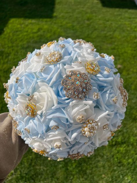 Handmade Quinceañera Bouquet/ Wedding. With Light Blue, Bahama Blue and White Foamy Roses. Finished off with Gold brooches. *Please note brooches can change in style due to availability.* Decor / color combinations can be changed upon request. {This is a made to order Bouquet}