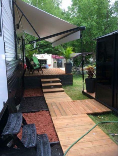 Rv site landscaping Seasonal Rv Lot Landscaping, Diy Camper Deck, Rv Outside Decorating Ideas Patio, Rv Sites Landscaping, Trailer Park Landscaping Ideas, Rv Site Decorating Ideas, Rv Landscaping Ideas, Camp Site Set Up Ideas Glamping, Rv Site Setup Ideas