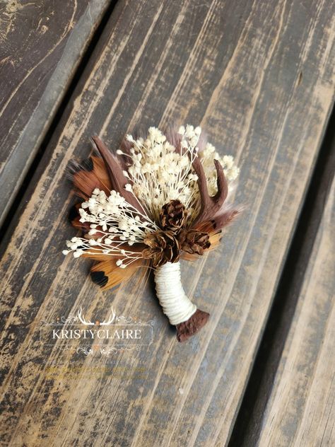 Custom Order For Racheal ❤️ Thank You! 
.
Brown Antler Boutonnieres with Preserved Babysbreath, Pampas Grass, Pinecones & Ivory Twine. 
.
WWW.KRISTYCLAIREFLORALDESIGN.COM 
WWW.KRISTYCLAIRE.ETSY.COM 
.
#weddingboutonniere #wedding #weddingideas #Antler #antlerart #brown #antlerdecor #faux #resin #pinecones #babysbreath #preservedflower #ivory #pheasant #pampasgrass #Groom #groomsmen #boutonniere #lapelpin #pin #corsage #buttonhole #idea #unique #holiday #country #barn #hunting #western #whitetail Western Wedding Corsage, Pheasant Wedding Decor, Antler Boutonniere, Antler Wedding Decor, Deer Antler Wedding, Pin Corsage, Groomsmen Boutonniere, Antler Art, Dried Florals