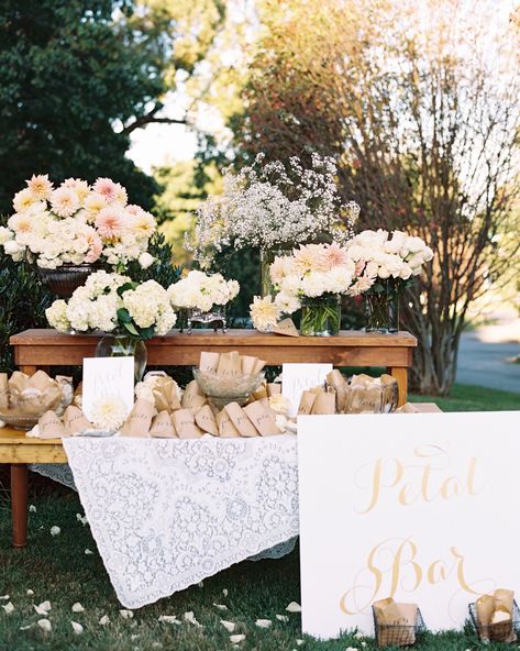 10 Ideas for Petal Bars at Your Wedding Ceremony #PetalBars #WeddingIdeas #WeddingTrends #WeddingPetalBar | Martha Stewart Weddings - Trending Now: Wedding Ceremony Petal Bars Outdoor Wedding Seating, Petal Toss Wedding, Creative Wedding Sign, Petal Toss, Wedding Exits, Wedding Petals, Flower Bar, Ceremony Seating, Maryland Wedding