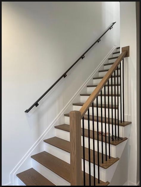 Elevate your staircase with the sleek and modern Black Metal Slim Rectangle Handrail Set. Its clean lines and slim profile offer a contemporary touch, while the included brackets and hardware ensure a hassle-free installation. With a durable powder coat finish, this handrail is not only visually appealing but also suitable for both indoor and outdoor use. Upgrade your stairs and make a stylish statement with this unique and functional handrail solution. Check out our very own slim modern handrai Modern Stairway, Metal Handrails For Stairs, Handrail For Stairs, Indoor Stair Railing, Stairs Black, Black Stair Railing, Metal Handrail, Wall Mounted Handrail, Indoor Railing