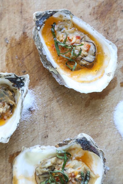 These grilled oysters are topped with an addictive chipotle bourbon butter, inspired by the BBQ oysters at Hog Island Oyster. They're also great broiled! | Recipe on Feed Me Phoebe Bbq Oysters, Bourbon Butter, Grill Dessert, Tomales Bay, Grilled Oysters, Oyster Recipes, Butter Recipes, Butter Recipe, Seafood Dishes