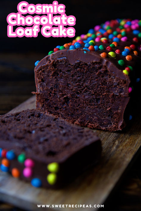 This Cosmic Chocolate Loaf Cake is a chocolate chip chocolate loaf drenched in chocolate glaze and fun rainbow chips. If you are a fan of the Cosmic Brownie you will love this cake. #cakerecipes #chocolatecake #cosmicbrownie Christmas Cosmic Brownies, Chocolate Brownie Bread, Easy Christmas Loaf Cake, Brownie Loaf, Mini Loaf Pan Dessert Recipes, Dessert Bread Loaf, Dessert Bread Recipes Loaf Pan, Mini Loaf Cake Recipes Easy, Loaf Cake Ideas