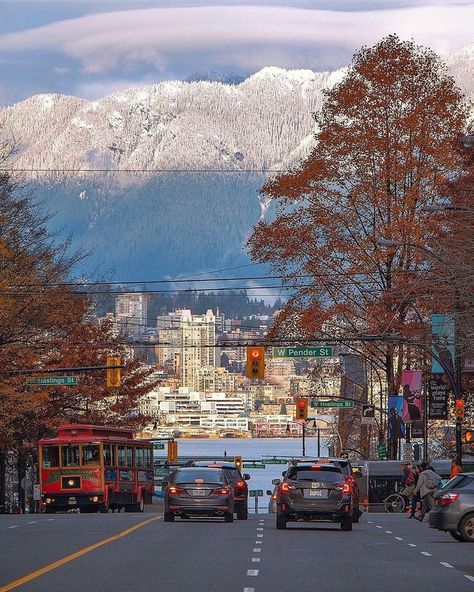 Vancouver BC Canada 🇨🇦 on Instagram: “The Streets of Vancouver 🚃🏔🏢 . The clouds lift to reveal a snowcapped Mount Seymour. Looking northeast up Burrard Street from Dunsmuir to…” Vancouver City, Canada City, Canada Road Trip, Vancouver Bc Canada, Late Autumn, Downtown Vancouver, O Canada, North Vancouver, Road Trip Planning