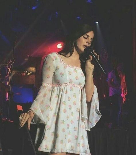 Lana Del Rey performing in a babydoll dress Lana Del Rey Performing, Babydoll Dress, Lana Del Rey, A Woman