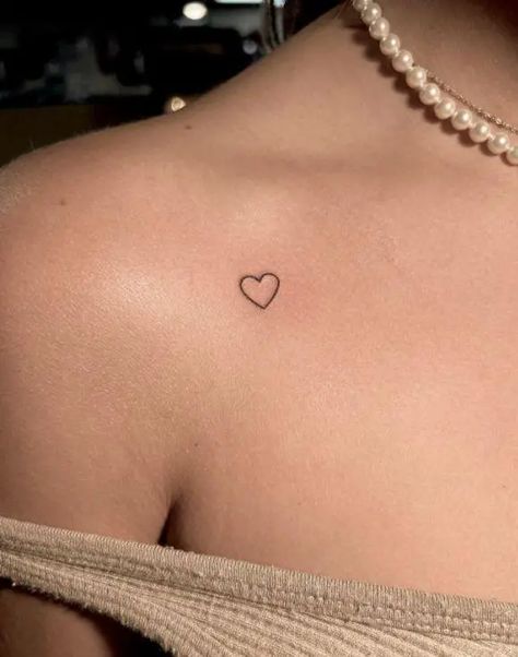 The Best 53 Small Heart Tattoo Designs You’ll Never Get Tired Of - Psycho Tats Simple And Small Tattoos For Women, Woman’s Small Tattoos, Small Top Of Hand Tattoos, Areas For Tattoos For Women, Small Tat Ideas For Women, Cute Small Chest Tattoos For Women, Cute Tattoos Heart, Cute And Simple Tattoos For Women, Line Work Heart Tattoo