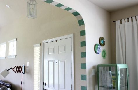 Decorate Archway In Home, Painted Arch, Archways In Homes, Kitchen Pass Through, Kitchen Pass, Striped Kitchen, Doorway Decor, Sitting On The Couch, Accent Wall Paint