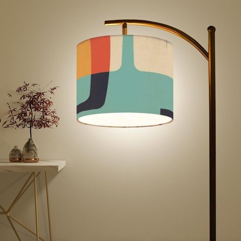 Perfect for living rooms, bedrooms, and offices, this lamp adds a touch of elegance and style. Its sleek design and clean lines will surely impress your guests. Say goodbye to boring lighting and hello to sophistication! Material: Linen + Metal Product Dimensions: Overall size: 60" x 10" Shade height: 9" Shade diameter: 11" Design Details: Single-sided printing Printing Technique: UV Printing Product Features: This floor lamp includes a rotating lamp holder that can swivel up to 180o, allowing you to adjust the light angle precisely for different tasks. It comes with a remote-controlled LED bulb that offers stepless brightness adjustment from 5% to 100% and color temperatures ranging from 3000K to 6500K to suit your needs. The lamp is operated with a convenient footswitch, making it easy t Mid Century Modern Foyer, Midcentury Modern Lamp, Japanese Mid Century Modern, Midcentury Lighting, Retro Floor Lamp, Mid Century Modern Floor Lamp, Mid Century Entryway, Unique Lamp Shades, Mid Century Modern Floor