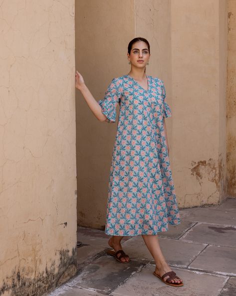 Summer 2024 - New Arrivals! Slip right into our Rose Peri Dress…with a joyful print, flouncy cuffs and on-seam hip pockets, this floral frock will soon become your favourite day dress! Shop our Dress Address collection in stores and online at www.cottonsjaipur.com [ Cottons Jaipur, Cotton, Block print, Floral, Dresses, Handmade Dresses, Everyday-wear, Summer staples ] #cottons #cottonsjaipur #newarrivals #floral #summer #summer2024 #blockprint #handcraftedkurtas #summerdresses #comfortfi... Cottons Jaipur, Printed Frock, Dresses Everyday, Dresses Handmade, Ethnic Dresses, Floral Frocks, Ethnic Dress, Floral Dresses, Summer Staples