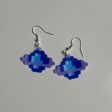 Saturn planet mini perler bead earrings 🪐 Tiny Hama Bead Designs, Perler Bead Planet Patterns, Planet Perler Beads, Perler Beads Space, Pyssla Earrings, Space Perler Beads, Iron Beads Ideas Cute, Small Hama Bead Designs, Small Perler Bead Patterns Minis