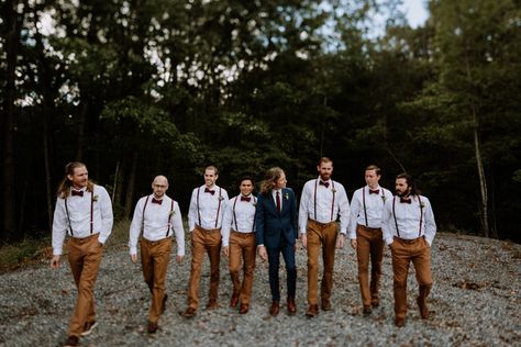 These groomsmen wore khaki pants, white button-ups, and red accessories for this Virginia wedding | Image by Earthmark Photography Khaki And Suspenders Wedding, Mens Wedding Attire Khaki Pants, Khaki Pants With Suspenders Wedding, Groomsmen Khaki Pants Suspenders, Black And Khaki Groomsmen, Groomsman Khaki Pants, Dark Khaki Groomsmen Attire, Navy Blue And Khaki Wedding, Groomsmen In Khaki Pants