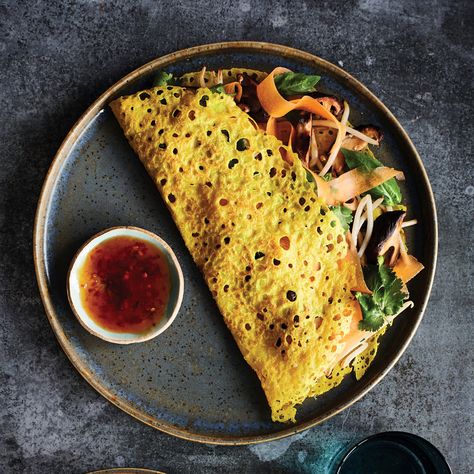 Vietnamese Crispy Pancakes | sheerluxe.com Sweet Chilli Sauce Recipe, Vietnamese Pancakes, Crispy Pancakes, Curry Recipes Vegetarian, Herb Salad, Vegetarian Curry, Sweet Chilli Sauce, Sweet Chilli, Asian Dishes