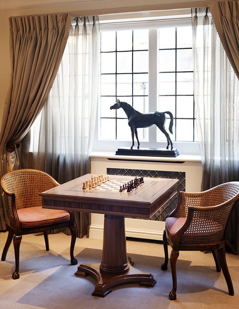 Chess Table In Library, Chess Living Room, Chess Inspired Furniture, Chess Room Ideas, Chess Board In Living Room, Living Room Game Table, Chess Set Decor Living Rooms, Chess Table Aesthetic, Chess Room Design