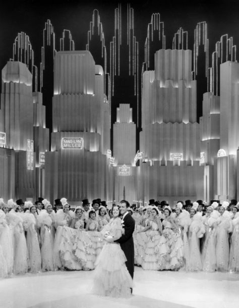 Broadway Melody of 1938via ladylikelady  Late 1930s Art Deco musical set. I have the Busby Berkeley DVD boxed set so I certainly appreciate.  ladylikelady:    Broadway Melody of 1938 (1937) Robert Taylor and Eleanor Powell Hollywood Art Deco, Theatre Architecture, Interior Art Deco, Busby Berkeley, Eleanor Powell, Theater Architecture, Tv Set Design, Robert Taylor, Music Theatre