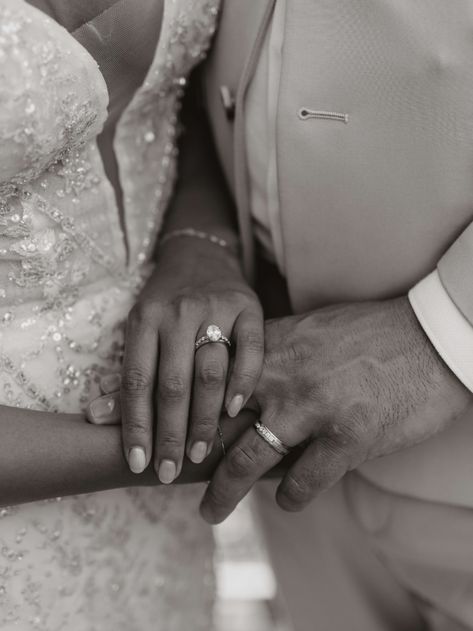 a bride In a sparkling dress holds hands with her groom. The rings are in front of them and the camera is capturing their rings. the photo is in black and white. Close Up Wedding Photos, Groom Detail Shots Picture Ideas, Bride And Groom Close Up, Close Up Bride And Groom Photos, Bride And Groom Hands Ring Shots, Photos Of Groom Getting Ready, Wedding Shot List, Shot List, Wedding Hands