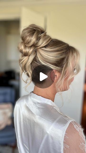 Charleston Bridal Hairstylist on Instagram: "When you bring your bride to tears 😭  Rachael was torn between two styles: the high bun and a half-up ponytail.   There was no time for a bridal preview since Rachael had just 2 weeks and was coming from out of town (fellow northerner, Long Island, NY 🥰) to plan an intimate wedding with her closest friends and family. She was prepared for either style, knowing she would need clip-in extensions if she decided on the half-up, which she had just in case. 🩷  She waited until her wedding day to decide, basing it on the weather. Last Sunday was a hot day 🥵 so she opted for the high bun😍 She showed me a couple of photos of how she wanted the bun and face framing, preferring a bun look over a French twist updo.  When I handed her the mirror after I High Bun With Hair Piece, Wedding Hair Updos With Extensions, High Updo Wedding Hair With Veil, Hair Do Long Hair Wedding, Double Bun Wedding Hair, High Bun With Pieces Out, How To High Bun Updo, Textured High Bun Wedding, High Veil Placement Bridal Updo