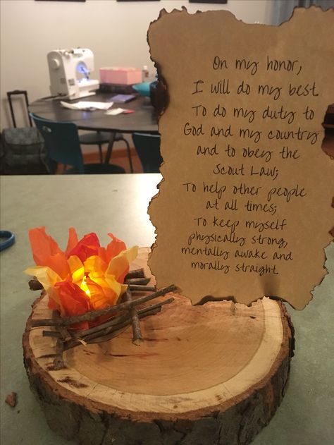 Eagle Scout centerpiece Cricut Eagle Scout, Eagle Award Ceremony, Eagle Scout Desserts, Eagle Scout Celebration Ideas, Fire Centerpiece Ideas, Cub Scout Recruitment Table, Eagle Scout Ceremony Ideas, Eagle Scout Party Ideas, Eagle Ceremony Ideas