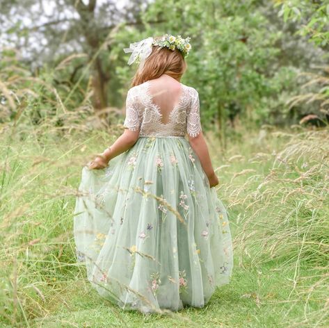 'Enchanted Dress - Fern Green /White Lace' These are so stunning, a truly beautiful girl's occasion dress. Our enchanting lace and tulle with our newest patterned lace is a perfect flower girl dress. It is made with a delicate floral patterned off-white coloured lace bodice, with a matching embroidered fern /sage green tulle skirt. The V-shaped back with unfinished lace adds the perfect vintage charm to this dress. The lace bodice is baby-soft and has a slight stretch. While our dresses are wide Flower Girl Dress For Kids, Sage Green Bridesmaid Dresses For Kids, Sage Green And White Dress, Fairy Flower Girl Dress, Spring Flower Girl Dresses, Olive Green Flower Girl Dress, Flower Girl Dresses Sage Green, Flower Girl Sage Green, Older Flower Girl Dresses