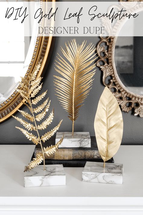 How to make a knock-off gold leaf sculpture using faux leaves, spray paint, scrap wood, and marble contact paper for a designer look for less. Diy Gold Leaf, Metallic Gold Spray Paint, Rustoleum Metallic, Decoration For Wall, Leaf Sculpture, Hanging Leaf, Farmhouse Diy Projects, Dining Table Makeover, Leaf Decoration