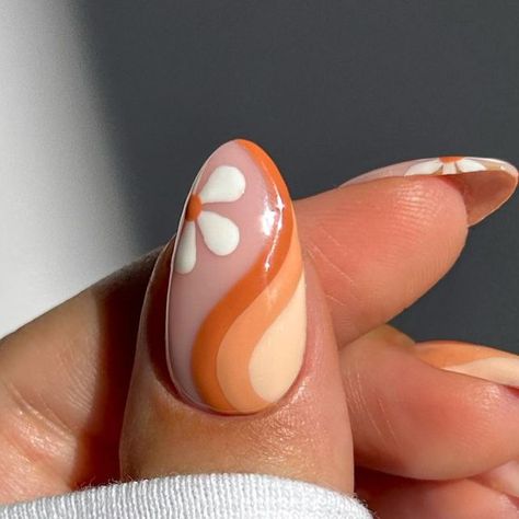 the nailologist🍒🌸🦋🌈✨ on Instagram: "Autumnal orange swirls 🍁☁️🍂 #autumnnails #fallnails #nailinspo #nails #nailart #nailtutorial" Swirly Flower Nails, 70s Nails Retro Fall, Colorful Fall Nail Designs, 1960s Nail Art, Purple And Orange Nail Art, Retro Design Nails, 60s Nail Art Retro, Retro Swirl Nails, 70s Swirl Nails