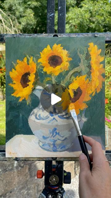 Clare Bowen Art - Plein Air on Instagram: "Sunflower season!🌻A still life painting demo in the garden, looking at shapes & colour mixing. Sorry the filming has got some glare, it was low afternoon sun. (See the difference in colour of the painting at end of vid, filmed in my studio!)  Available  10x12” oil on board  ‘Sunflowers in Blue & White Jug’ * * #paintingforsale #oilpainting #allaprima #sunflowers #sunflower #rosemarybrushes #sunflowerpainting #stilllife #stilllifepainting #🌻 #impressionistart #paintingoftheday #oilsketch #flowerpainting #flowerart #paintings #clarebowenartistflowers" How To Paint Sunflowers, Sunflowers Oil Painting, Sunflower Still Life Painting, Vase Of Sunflowers Painting, Sunflower Oil Painting, Chinoiserie Painting, Clare Bowen, Sunflower Sculpture Painting, Oil Paint Sunflower