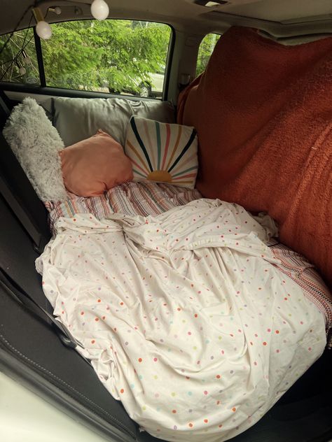 the cutest comfiest backseat air matress in a suburu legacy, perfect for festivals. Car Matress Ideas, Car Backseat Bed, Backseat Date, Comfy Backseat Car, Road Trip Bed In Car, Backseat Car Camping, Car Decorations Interior Backseat, Cozy Backseat Car, Road Trip Backseat Setup