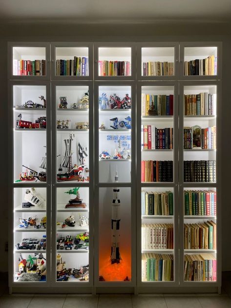 #ikeahack #ikeadiy #furniture Living Room Lego Display, Billy Bookcase With Lights, Lego Billy Ikea, Bookshelves With Led Lights, Lego And Book Display, Lego Display Bookcase, Lego Glass Display Cabinet, Billy Bookcase Display Cabinet, Lego Display Office