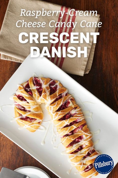 Whether you need to distract the kids from opening presents on Christmas morning or feed your overnight guests around the holidays, this candy cane-shaped Danish filled with fresh raspberries and cream cheese is the way to do it. Cream Cheese Candy Cane, Cream Cheese Candy, Crescent Danish, Breakfast Christmas Morning, Christmas Supper, Breakfast Christmas, Raspberry Cream Cheese, Raspberry Jelly, Christmas Pastries