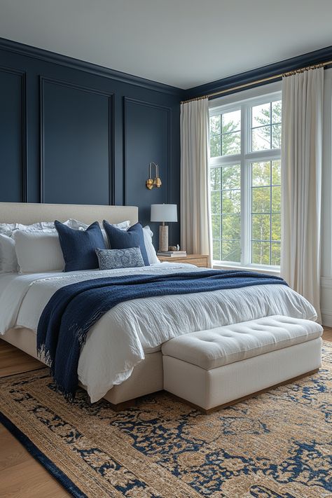 Create a luxurious and inviting atmosphere with navy blue and gold bedroom ideas.  Explore deep navy walls and gold accent furniture for a sophisticated look.  Discover navy velvet headboards, gold-framed mirrors, and brass light fixtures to add elegance and warmth.  Find inspiration for navy and gold throw pillows, gold geometric wall art, and plush navy carpets to design a comfortable and stylish sleeping space. Navy Blue Wall Bedroom Ideas, Blue Velvet Headboard Bedroom Ideas, Navy And Light Blue Bedroom, Navy Blue Feature Wall Bedroom, Navy Master Bedrooms Decor, Navy Blue Gold Bedroom, Navy Blue And Cream Bedroom, Dark Blue Room Bedroom, Navy And Beige Bedroom