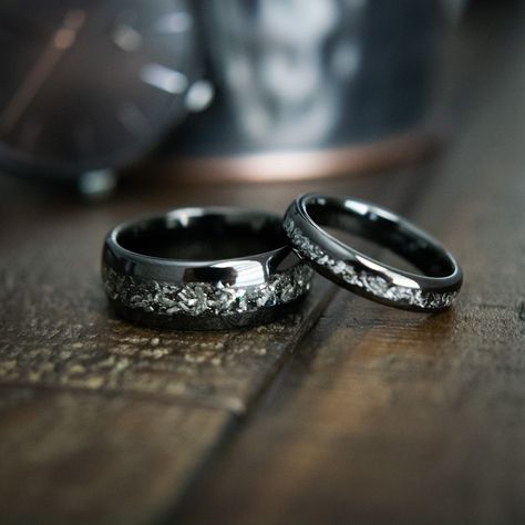 Crafted with genuine meteorite fragments that fell from space in prehistoric times, this black tungsten wedding band for him is a rare galactic treasure. Against all odds, you found your Juliet in an infinite universe. Now, start the next chapter of your story together in style. Wedding Bands His And Hers, Couples Wedding Rings Set, Meteorite Wedding Rings, Meteorite Wedding Band, Black Tungsten Wedding Band, Infinite Universe, Gibeon Meteorite, Rings Mens, Rings Promise