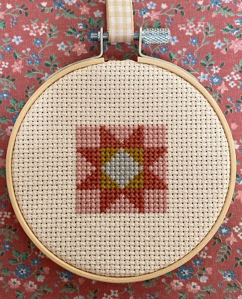 Beginners welcome here! My collection of mini cross-stitch patterns (and kits) are perfect for beginners of all ages! Easy to stitch with just a few supplies, these designs can be framed in a 3" hoop, ready to display in your home or be given as a gift to a friend. Full color 5.5" x 8.5" pattern, packaged in 2ml resealable clear hanging bag Professionally printed beginner how-to cross-stitch guide and Illustrated guide to special stitches included Finished size of design area: 19 sts wide x 19 s Quilt Cross Stitch Patterns Free, Cross Stitch Quilt Squares, Granny Square Cross Stitch, Cross Stitch Patchwork, Cross Stitch Quilt Pattern, Evil Eye Cross Stitch Pattern, Cross Stitch Basics, Cross Stitch Beginner Pattern, Cross Stitch Pin Cushion