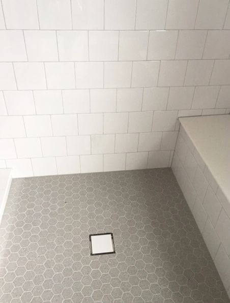 Gray Shower Floor Tile Ideas, 6x6 White Tile Bathroom Shower Walls, Gray Hexagon Shower Floor, Gray Hexagon Tile Shower Floor, Grey Hexagon Shower Floor, White Shower Gray Floor, 6x6 Shower Tile, White Square Tile Shower Wall, Gray Tile Shower Floor