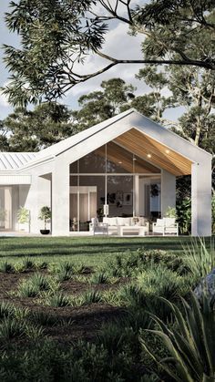 The Noosa is Queensland's take on the Scandi-Barn.  Lifestyle and luxury are the focus of this gorgeous home.  Click to see the floorplans

#scandibarn #housedesign #dreamhome #luxuryhome #modernbarnhouse #noosa #noosalife #queenslandbuilder #acreagebuilder #acreage #acreagelife #acreagelifestyle Sustainable Home Plans, Coastal Barn House, Acreage Homes Floor Plans, Scandi Barn House, Scandi Facade, Modern Gable Roof, White Modern Farmhouse Exterior, Acerage Homes, Contemporary Farmhouse Exterior