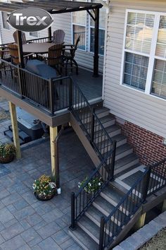 Small 2nd Floor Deck Ideas, Stairs Off Deck Ideas, Black Railing Stairs Outdoor, Trex Deck Stairs Ideas, Deck With Stairs To Backyard, Upper Deck Stairs To Patio, Composite Deck Stairs Railing Ideas, 2nd Story Deck Ideas Staircase, Exterior Deck Stairs