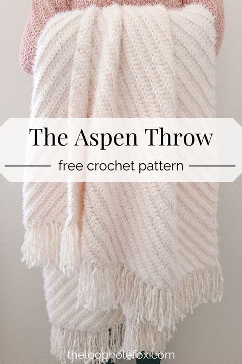 Embrace Hygge this season with the Aspen Throw, a crochet blanket pattern. This easy crochet throw blanket works up quickly, is beginner friendly and is perfect to cozy up in. You will love the diagonal ribbing and simplicity of the design. Created using only half double crochet stitches and sets of two row repeats, you'll be snuggled up in no time. Grab this free crochet pattern on The Loophole Fox. Modern Haken, Zig Zag Crochet, Crochet Throw Pattern, Throw Blanket Pattern, Crochet Blanket Pattern Easy, Crochet Afghan Patterns Free, Half Double Crochet Stitch, Confection Au Crochet, Easy Crochet Blanket