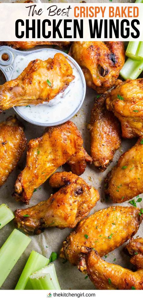 image: crispy baked chicken wings and celery sticks with ranch dressing in vintage measuring cup. Title text: The Best Crispy Baked Chicken Wings Healthy Baked Wings Oven, Baked Chicken Party Wings Recipes, How To Make Wings Crispy In Oven, Game Day Chicken Wings, Oven Fried Chicken Wings Baking Soda, Baked Chicken Wings Oven Easy, Bone In Chicken Wings Oven Baked, Asian Wings Recipe Oven Baked, Oven Baked Party Wings