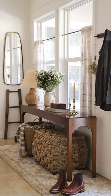 Entryway Table Under Window, Front Door Table, Entry Way With Bench And Table, Entry Table Under Window, Entryway Ideas With Window, Entryway Table In Front Of Window, Cottage Console Table Decor, Poufs Under Entryway Table, Entry Table In Front Of Window