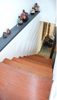 stone ledge above stair http://roberttaffera.com Ledge In Basement Wall, Picture Ledges Staircase, Basement Stair Ledge, Basement Stairs Decor Wall, Ledge Around Basement Wall, Stair Ledge Decorating Ideas, Stair Ledge Decor, Stairs Shelves, Open Basement Stairs