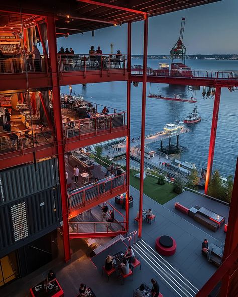 bar industrial repurposing the docks with bars, restaurants, breweries, and other amenities to active the waterfront with life. industrial spaces will eventually become overtaken by city grown and absorbed into the urban fabric. #imagine #midjourneyarchitect #midjourney #artificialintelligence #artificialarchitecture #artificialsketchbook #designboom #architecture #design #generativedesign #urban #city #seattle #industrial #bardesign #restaurantdesign Presentation Graphics, River Bar, Bar Industrial, Seattle Waterfront, Transformation Project, Industrial Architecture, Generative Design, Industrial Space, Waterfront Restaurant