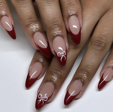 Red Nail Designs Minimal, Trendy Winter Nails 2024, Christmas Nails Inspo Almond, White And Dark Red Nails, Red Neutral Nails, Red And White Nail Inspo Acrylic, Red Almond Nails With Bow, Christmas Nails Aesthetic Almond, Red Nails With Simple Design