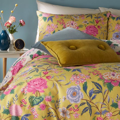 furn. Bamboo Yellow Azalea Floral Duvet Cover Set. Floral. Printed. Boho. Button Fastening. PolyCotton. 50% Polyester 50% Cotton. Featuring a 'bursting with colour' reversible design of bright blooms. Made using crisp polycotton making this duvet set soft and hard-wearing. Clear button closure for easy removal of duvet. Add instant happiness to your bedroom with the floral Azalea bedding, bursting with bright blooms. Featuring a fully reversible design, so you get two looks in one, perfect for s Yellow Bedding, Bedroom False Ceiling Design, Floral Duvet Cover, Floral Cushions, Green Bedding, Floral Bedding, Floral Duvet, Reversible Duvet Covers, Bedroom Furniture Design