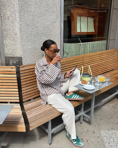 12 Chic Striped Shirts and How to Style Them | Who What Wear Oversized Button Down Shirt Outfit, Striped Shirt Outfit, Outfits With Striped Shirts, Looks Adidas, Adidas Samba Outfit, Samba Outfit, Style Casual Chic, Stripe Outfits, Cooler Look