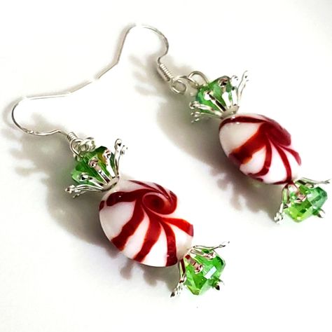 Handmade By Me In Birmingham Alabama! I Have These Red Peppermint Earrings In A Very Similar Version That Has Been Really Popular On Here And Other Selling Apps! They Are Made Acrylic Candy Beads, These Are Made With Glass Lamp Beads Lampwork Beads In A Peppermint Swirl! I Have Used Green Ab Swarovski Crystal Beads And Silver Plated Bead Caps To Make These Look Like The Candy Wrappers! I Have Used Stamped 925 Sterling Silver Ear Hooks, I Can Customize These With Leverbacks, Hoops, Ball Studs, And Many More Styles! These Are A Little More $ Than My Acrylic Ones They Cost Me More. Measures 2" Long Newly Made For Christmas Holidays 2023! Perfect Gift! I Have Red And Green Acrylic Peppermint Candy Jewelry Diy, Grinch Jewelry Diy, Cute Handmade Christmas Earrings, Cute Christmas Earrings, Diy Christmas Earrings Ideas, Beaded Christmas Jewelry, Bead Christmas Earrings, Handmaid Jewelry, Christmas Earrings Diy